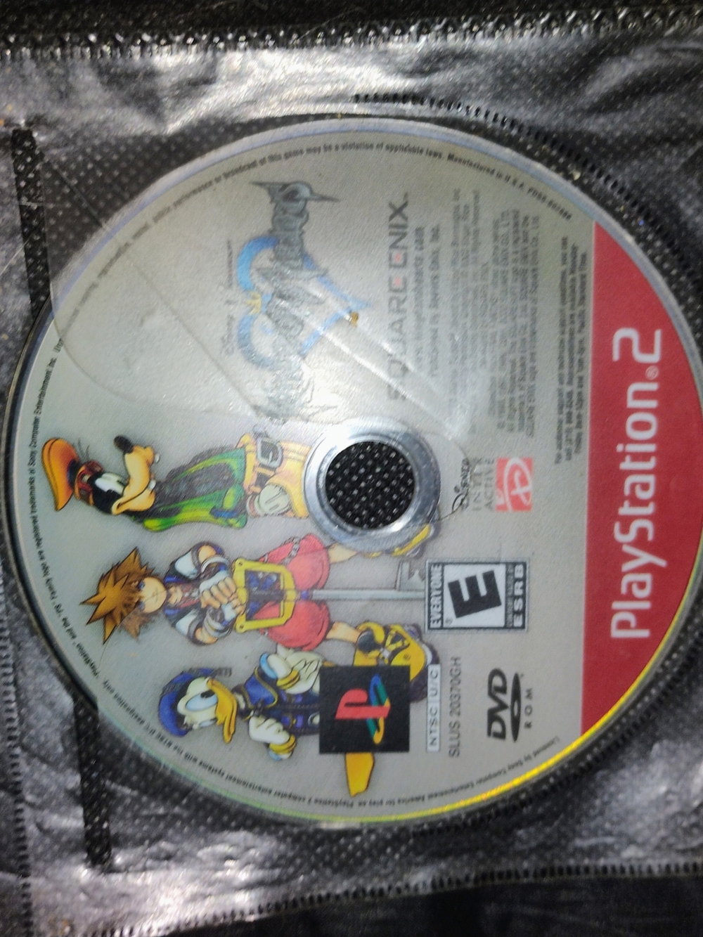 Sony PlayStation 2 Kingdom Hearts Game Disc - Silver with Red Label